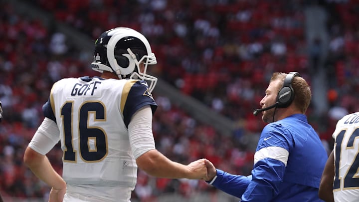Oct 20, 2019; Atlanta, GA, USA; Los Angeles Rams quarterback Jared Goff (16) celebrates his touchdown run with head coach Sean McVay in the third quarter against the Atlanta Falcons at Mercedes-Benz Stadium. Mandatory Credit: Jason Getz-Imagn Images