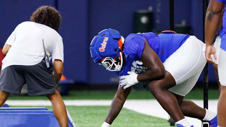Florida Gators defensive lineman Brendan Bett (90) waits for a drill starts during fall football practice at Sanders Indoor Practice Facility at the University of Florida in Gainesville, FL on Thursday, August 14, 2025. [Matt Pendleton/Gainesville Sun]