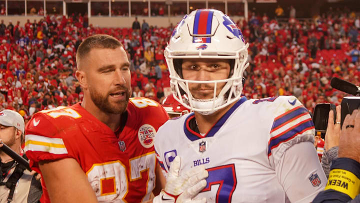 Kansas City Chiefs tight end Travis Kelce talks with Buffalo Bills quarterback Josh Allen 