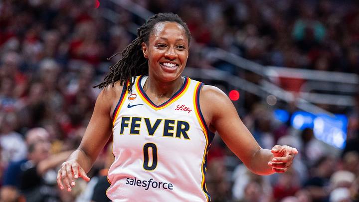 Jul 22, 2026; Indianapolis, Indiana, USA; Indiana Fever guard Kelsey Mitchell (0) celebrates a made shot in the first half against the Connecticut Sun at Gainbridge Fieldhouse. Mandatory Credit: Trevor Ruszkowski-Imagn Images Jul 22, 2026; Indianapolis, Indiana, USA; Indiana Fever guard Kelsey Mitchell (0) celebrates a made shot in the first half against the Connecticut Sun at Gainbridge Fieldhouse. Mandatory Credit: Trevor Ruszkowski-Imagn Images