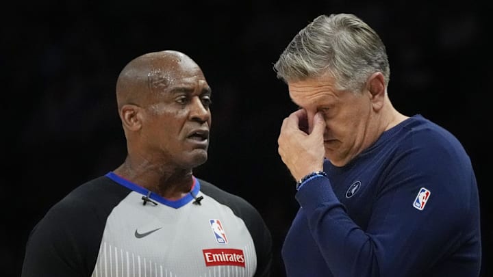 Jan 8, 2026; Minneapolis, Minnesota, USA; Minnesota Timberwolves head coach Chris Finch questions referee Derrick Collins on a call for the Cleveland Cavaliers in the first quarter at Target Center. Mandatory Credit: Bruce Kluckhohn-Imagn Images Jan 8, 2026; Minneapolis, Minnesota, USA; Minnesota Timberwolves head coach Chris Finch questions referee Derrick Collins on a call for the Cleveland Cavaliers in the first quarter at Target Center. Mandatory Credit: Bruce Kluckhohn-Imagn Images
