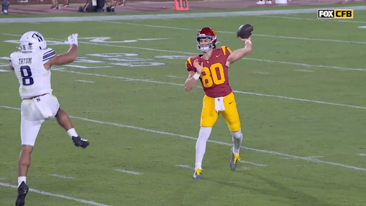 USC quarterback Sam Huard completed a pass on a sly fake punt