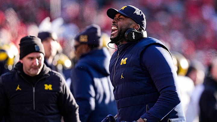 Michigan head coach Sherrone Moore celebrates a play against Ohio State during the second half at Ohio Stadium in Columbus, Ohio on Saturday, Nov. 30, 2024.