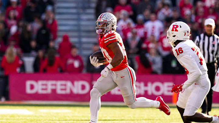 Ohio State Buckeyes running back James Peoples (20) runs the ball in the second half of the NCAA football game at Ohio Stadium on Saturday, Nov. 22, 2025 in Columbus, Ohio.