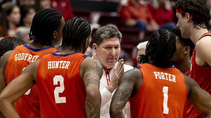 Clemson Tigers head coach Brad Brownell talks with guard Jestin Porter (1), guard Dillon Hunter (