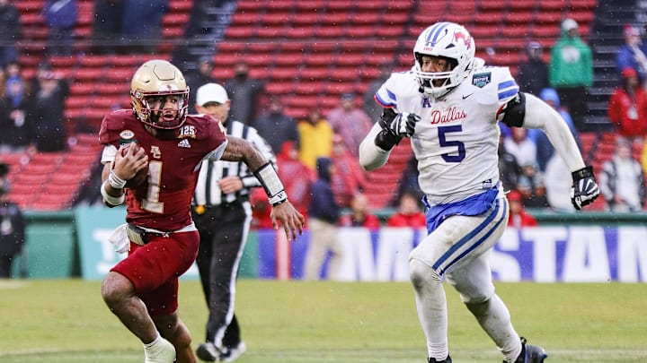 Boston College's Thomas Castellanos carries the ball during the second annual Wasabi Fenway Bowl vs. SMU at Fenway Park on Thursday, Dec. 28, 2023.