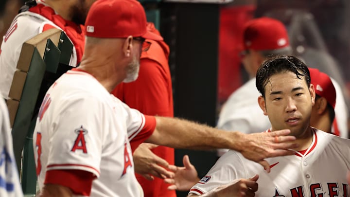 Angels starting pitcher Yusei Kikuchi (16, center) is greeted in the dugout after pitching in the sixth inning against the Tampa Bay Rays at Angel Stadium on Aug. 4.