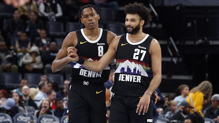 Nov 24, 2025; Memphis, Tennessee, USA; Denver Nuggets guard Peyton Watson (8) reacts with guard Jamal Murray (27) during the fourth quarter against the Memphis Grizzlies at FedExForum. Mandatory Credit: Petre Thomas-Imagn Images