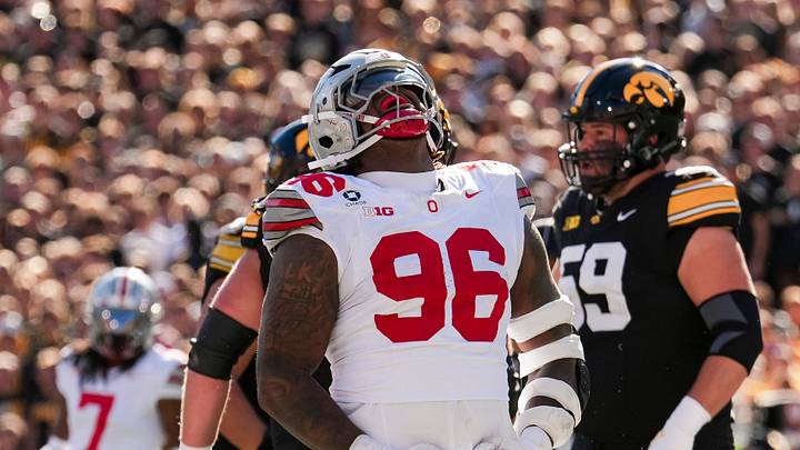Ohio State Buckeyes defensive end Eddrick Houston (96) reacts after a tackle during the NCAA football game against the Iowa Hawkeyes at Kinnick Stadium in Iowa City on Oct. 3, 2026. Ohio State Buckeyes defensive end Eddrick Houston (96) reacts after a tackle during the NCAA football game against the Iowa Hawkeyes at Kinnick Stadium in Iowa City on Oct. 3, 2026.