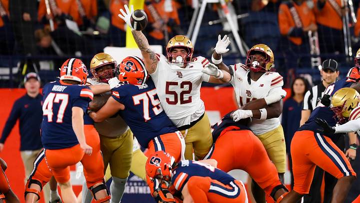 Nov 29, 2025; Syracuse, New York, USA; Boston College Eagles defensive lineman Chris Marable Jr. (52) attempts to block a field goal attempt by Syracuse Orange place kicker Tripp Woody (47) during the first half at the JMA Wireless Dome. Mandatory Credit: Rich Barnes-Imagn Images Nov 29, 2025; Syracuse, New York, USA; Boston College Eagles defensive lineman Chris Marable Jr. (52) attempts to block a field goal attempt by Syracuse Orange place kicker Tripp Woody (47) during the first half at the JMA Wireless Dome. Mandatory Credit: Rich Barnes-Imagn Images