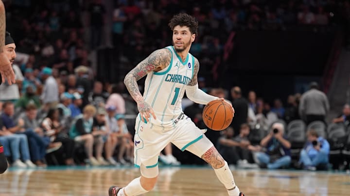 Charlotte Hornets guard LaMelo Ball (1) moves the ball during the second half during the play-in rounds