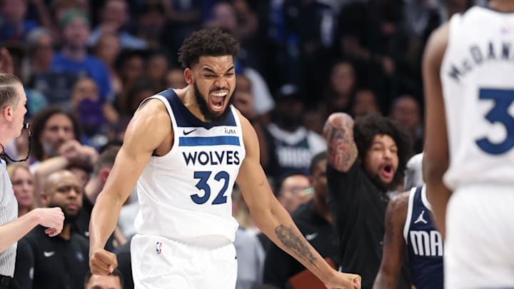 May 28, 2024; Dallas, Texas, USA; Minnesota Timberwolves center Karl-Anthony Towns (32) reacts during the fourth quarter against the Dallas Mavericks in game four of the western conference finals for the 2024 NBA playoffs at American Airlines Center. Mandatory Credit: Kevin Jairaj-Imagn Images