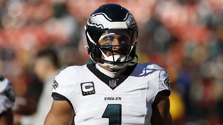 Dec 22, 2024; Landover, Maryland, USA; Philadelphia Eagles quarterback Jalen Hurts (1) stands on the field during warmup prior to the game against the Washington Commanders at Northwest Stadium. Mandatory Credit: Geoff Burke-Imagn Images