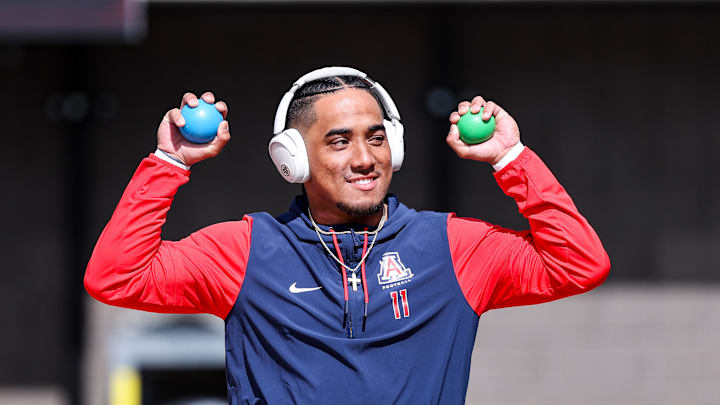 Oct 19, 2024; Tucson, Arizona, USA; Arizona Wildcats quarterback Noah Fifita (11) warms up before game against Colorado Buffaloes at Arizona Stadium. Mandatory Credit: Aryanna Frank-Imagn Images