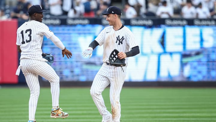 Mar 29, 2025; Bronx, New York, USA; New York Yankees second baseman Jazz Chisholm Jr. (13) and left fielder Cody Bellinger (35) celebrate after defeating the Milwaukee Brewers 20-9 at Yankee Stadium. Mandatory Credit: Wendell Cruz-Imagn Images Mar 29, 2025; Bronx, New York, USA; New York Yankees second baseman Jazz Chisholm Jr. (13) and left fielder Cody Bellinger (35) celebrate after defeating the Milwaukee Brewers 20-9 at Yankee Stadium. Mandatory Credit: Wendell Cruz-Imagn Images