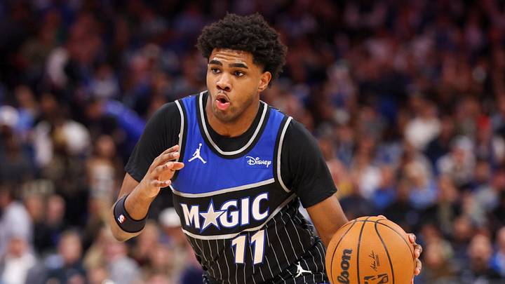 Orlando Magic guard Jase Richardson controls the ball against the Charlotte Hornets. Orlando Magic guard Jase Richardson controls the ball against the Charlotte Hornets.