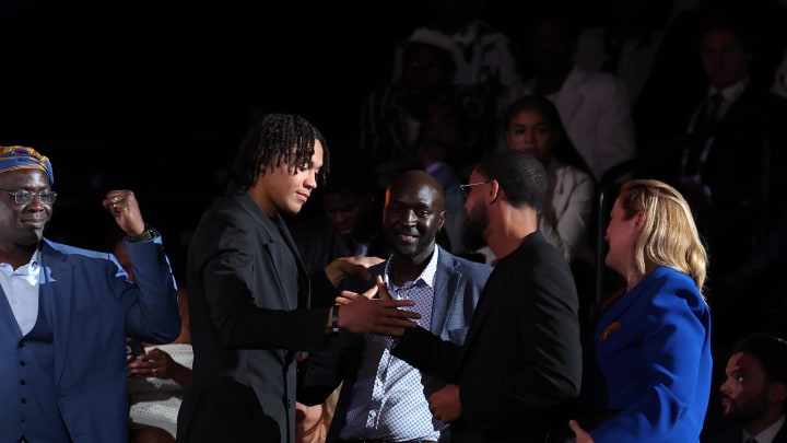 Jun 26, 2024; Brooklyn, NY, USA; Pacome Dadiet reacts after being selected in the first round by the New York Knicks in the 2024 NBA Draft at Barclays Center. Mandatory Credit: Brad Penner-USA TODAY Sports Jun 26, 2024; Brooklyn, NY, USA; Pacome Dadiet reacts after being selected in the first round by the New York Knicks in the 2024 NBA Draft at Barclays Center. Mandatory Credit: Brad Penner-USA TODAY Sports