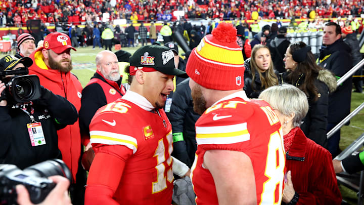 Jan 26, 2025; Kansas City, MO, USA; Kansas City Chiefs quarterback Patrick Mahomes (15) and tight end Travis Kelce (87) react after the AFC Championship gameagainst the Buffalo Bills at GEHA Field at Arrowhead Stadium. Mandatory Credit: Mark J. Rebilas-Imagn Images