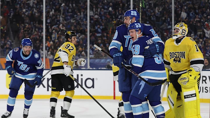 Feb 1, 2026; Tampa Bay, Florida, USA; Tampa Bay Lightning left wing Nick Paul (20) reacts with center Jake Guentzel (59) after scoring a goal against the Boston Bruins during the second period in the 2026 Stadium Series ice hockey game at Raymond James Stadium. Mandatory Credit: Kim Klement Neitzel-Imagn Images