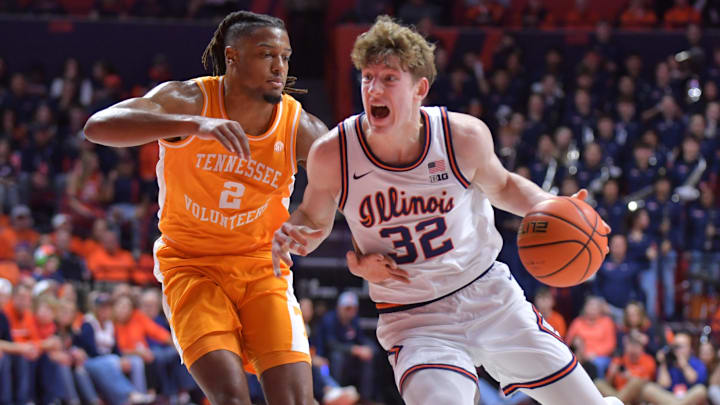 Dec 14, 2024; Champaign, Illinois, USA; Illinois Fighting Illini guard Kasparas Jakucionis (32) drives the ball against Tennessee Volunteers guard Chaz Lanier (2) during the first half at State Farm Center. Mandatory Credit: Ron Johnson-Imagn Images Dec 14, 2024; Champaign, Illinois, USA; Illinois Fighting Illini guard Kasparas Jakucionis (32) drives the ball against Tennessee Volunteers guard Chaz Lanier (2) during the first half at State Farm Center. Mandatory Credit: Ron Johnson-Imagn Images
