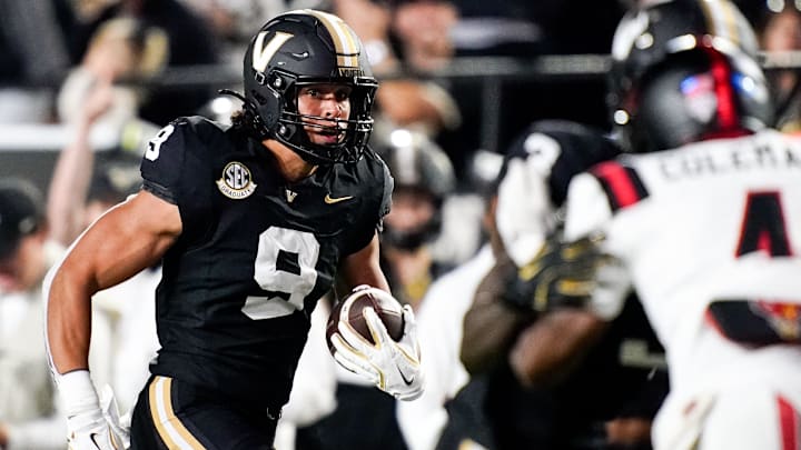 Vanderbilt tight end Eli Stowers (9) runs in a touchdown against Ball State during the second quarter at FirstBank Stadium in Nashville, Tenn., Saturday, Oct. 19, 2024.