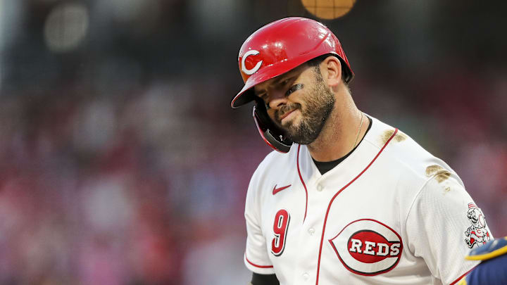 Cincinnati Reds first baseman Mike Moustakas (9) reacts.