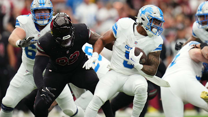 Arizona Cardinals defensive lineman Bilal Nichols (92) tackles Detroit Lions running back David Montgomery (5) at State Farm Stadium in Glendale, Ariz., Sep 22, 2024. Arizona Cardinals defensive lineman Bilal Nichols (92) tackles Detroit Lions running back David Montgomery (5) at State Farm Stadium in Glendale, Ariz., Sep 22, 2024.