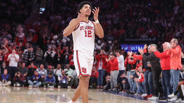 Feb 23, 2025; New York, New York, USA;  St. John's Red Storm guard RJ Luis Jr. (12) celebrates in the second half against the Connecticut Huskies at Madison Square Garden. Mandatory Credit: Wendell Cruz-Imagn Images
