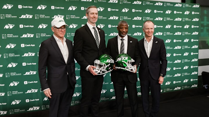 Jan 27, 2025; Florham Park, NJ, USA; New York Jets owner Woody Johnson, general manager Darren Mougey, head coach Aaron Glenn and vice chairman Christopher Johnson pose during an introductory press conference at Atlantic Health Jets Training Center. Mandatory Credit: John Jones-Imagn Images Jan 27, 2025; Florham Park, NJ, USA; New York Jets owner Woody Johnson, general manager Darren Mougey, head coach Aaron Glenn and vice chairman Christopher Johnson pose during an introductory press conference at Atlantic Health Jets Training Center. Mandatory Credit: John Jones-Imagn Images
