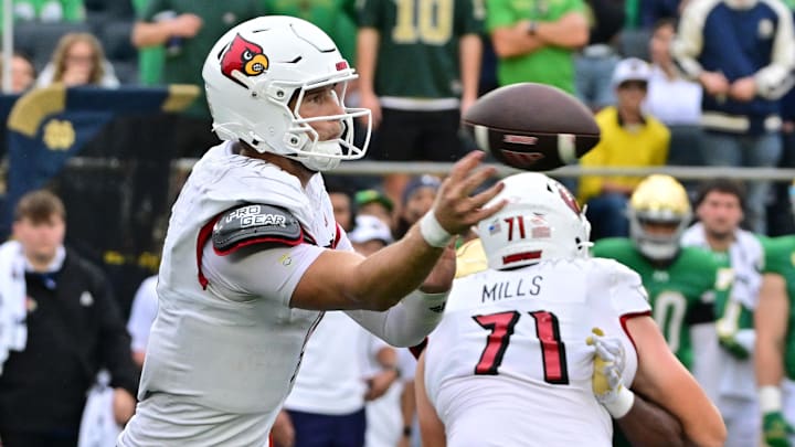 Sep 28, 2024; South Bend, Indiana, USA; Louisville Cardinals quarterback Tyler Shough (9) throws against the Notre Dame Fighting Irish in the second quarter at Notre Dame Stadium. Mandatory Credit: Matt Cashore-Imagn Images