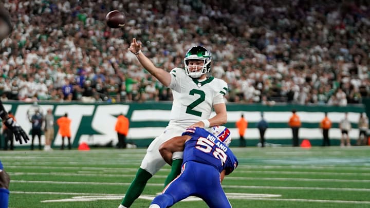 New York Jets quarterback Zach Wilson (2) throws the ball as Buffalo Bills linebacker Matt Milano