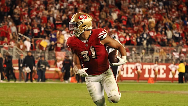 Oct 27, 2024; Santa Clara, California, USA; San Francisco 49ers running back Isaac Guerendo (31) carries the ball against the Dallas Cowboys during the fourth quarter at Levi's Stadium. Mandatory Credit: Kelley L Cox-Imagn Images Oct 27, 2024; Santa Clara, California, USA; San Francisco 49ers running back Isaac Guerendo (31) carries the ball against the Dallas Cowboys during the fourth quarter at Levi's Stadium. Mandatory Credit: Kelley L Cox-Imagn Images
