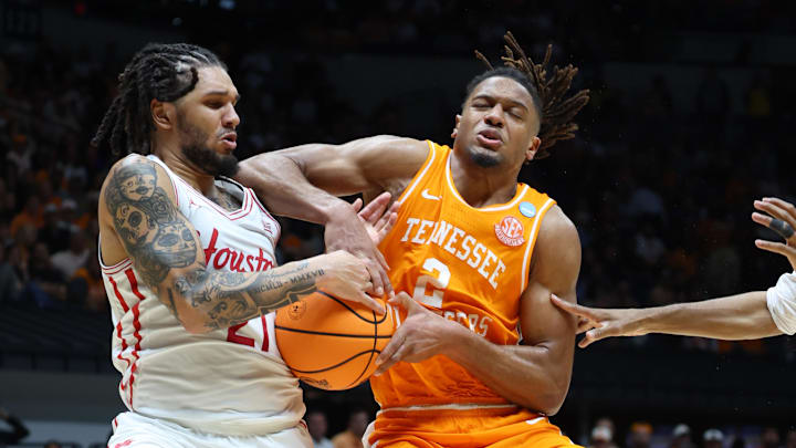Mar 30, 2025; Indianapolis, IN, USA; Houston Cougars guard Emanuel Sharp (21) steals the ball from Tennessee Volunteers guard Chaz Lanier (2) in the second half during the Midwest Regional final of the 2025 NCAA tournament at Lucas Oil Stadium. Mandatory Credit: Trevor Ruszkowski-Imagn Images