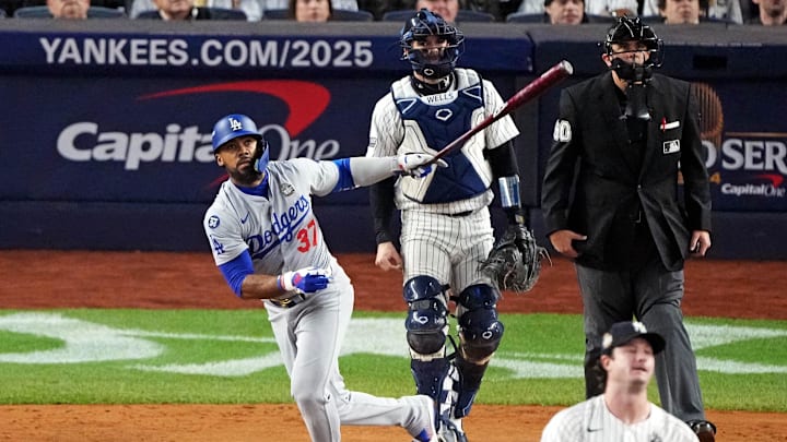 Los Angeles Dodgers outfielder Teoscar Hernandez (left) hits a two-RBI double run in Game 5 of the World Series against the New York Yankees on Wednesday at Yankee Stadium. Los Angeles Dodgers outfielder Teoscar Hernandez (left) hits a two-RBI double run in Game 5 of the World Series against the New York Yankees on Wednesday at Yankee Stadium.