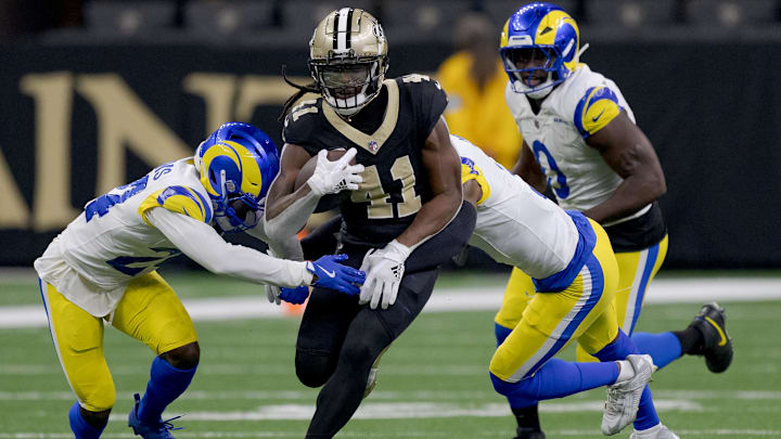 Dec 1, 2024; New Orleans, Louisiana, USA; New Orleans Saints running back Alvin Kamara (41) runs against the Los Angeles Rams during the first half at Caesars Superdome. Mandatory Credit: Matthew Hinton-Imagn Images Dec 1, 2024; New Orleans, Louisiana, USA; New Orleans Saints running back Alvin Kamara (41) runs against the Los Angeles Rams during the first half at Caesars Superdome. Mandatory Credit: Matthew Hinton-Imagn Images