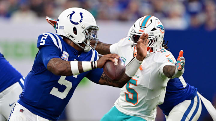 Oct 20, 2024; Indianapolis, Indiana, USA;  Indianapolis Colts quarterback Anthony Richardson (5) looks to get a ball past Miami Dolphins cornerback Jalen Ramsey (5) during the second quarter at Lucas Oil Stadium. Mandatory Credit: Marc Lebryk-Imagn Images