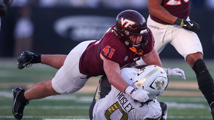 Oct 11, 2025; Atlanta, Georgia, USA; Virginia Tech Hokies linebacker George Ballance (41) tackles Georgia Tech Yellow Jackets running back Malachi Hosley (0) in the fourth quarter at Bobby Dodd Stadium at Hyundai Field. Mandatory Credit: Brett Davis-Imagn Images Oct 11, 2025; Atlanta, Georgia, USA; Virginia Tech Hokies linebacker George Ballance (41) tackles Georgia Tech Yellow Jackets running back Malachi Hosley (0) in the fourth quarter at Bobby Dodd Stadium at Hyundai Field. Mandatory Credit: Brett Davis-Imagn Images