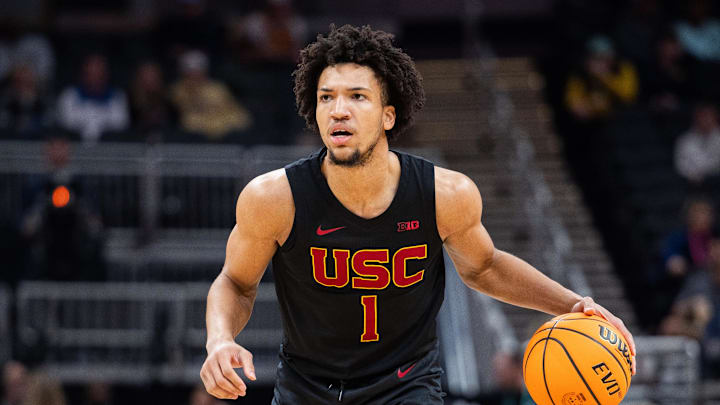 Mar 12, 2025; Indianapolis, IN, USA; USC Trojans guard Desmond Claude (1) dribbles the ball in the first half against the Rutgers Scarlet Knights at Gainbridge Fieldhouse. Mandatory Credit: Trevor Ruszkowski-Imagn Images