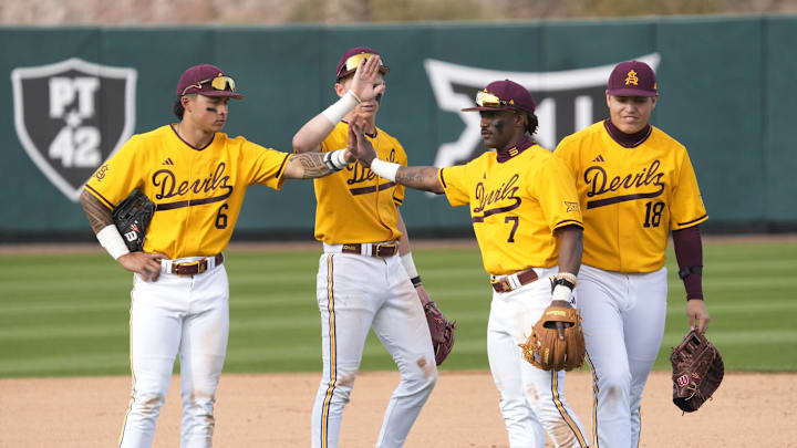 Arizona State players break during a pitching change against Ohio State during the seventh inning at Phoenix Municipal Stadium on Feb. 16, 2025.