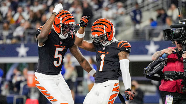 Cincinnati Bengals wide receiver Tee Higgins (5) and wide receiver Ja'Marr Chase (1) dance after Chase scored a touchdown in the 4th quarter to beat the Dallas Cowboys in Monday Night Football at AT&T Stadium in Arlington, Texas on Monday, December 9, 2024.