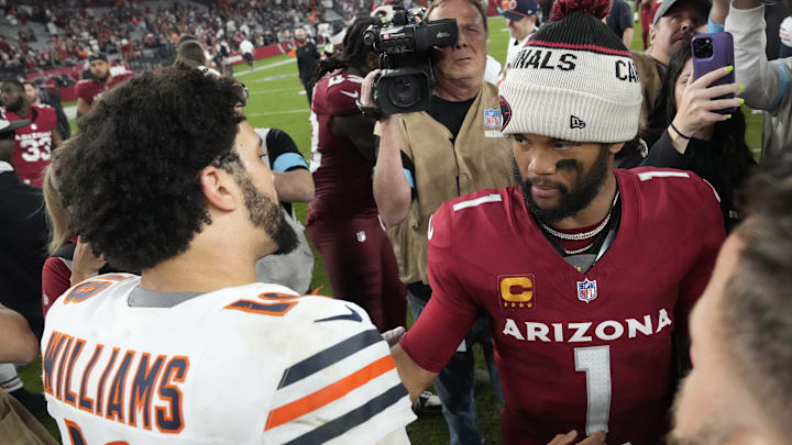 Chicago Bears quarterback Caleb Williams (18) and Arizona Cardinals quarterback Kyler Murray (1) shake hands after the Arizona Cardinals beat the Chicago Bears 29-9 at State Farm Stadium on Nov 3, 2024, in Glendale.