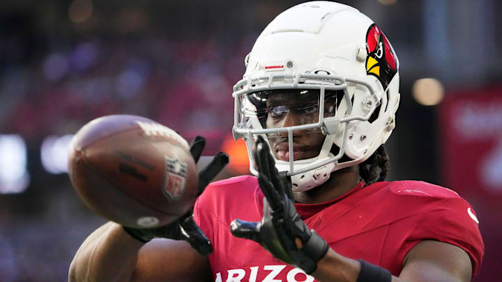 Arizona Cardinals wide receiver Marvin Harrison Jr. (18) warms up against the New York Jets during the second quarter at State Farm Stadium in Glendale on Nov. 10, 2024.