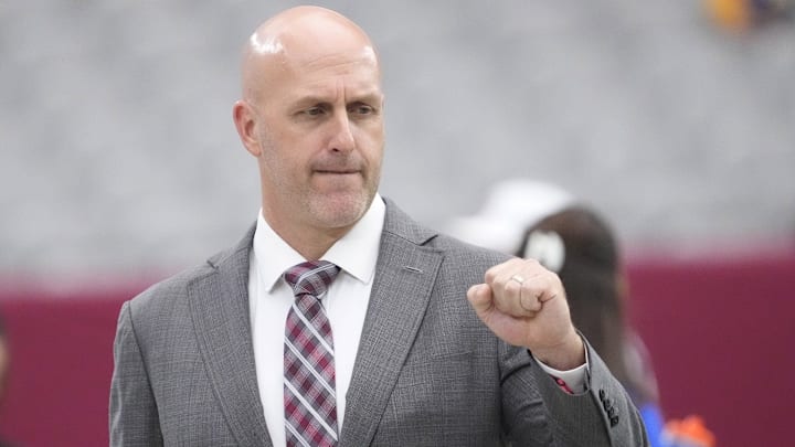 Arizona Cardinals general manager Monti Ossenfort watches his team warm up before playing against the Los Angeles Rams at State Farm Stadium on Sept. 15, 2024.
