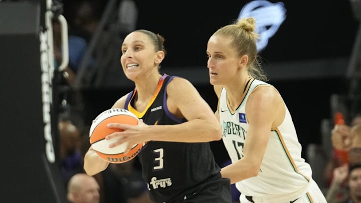 Phoenix Mercury guard Diana Taurasi (3) passes the ball up court in front of New York Liberty forward Leonie Fiebich (13) during the second quarter at Footprint Center on Aug. 26, 2024, in Phoenix