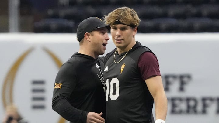 Arizona State quarterback Sam Leavitt (10) is greeted by head coach Kenny Dillingham before playing against Texas in the Chick-fil-A Peach Bowl on Jan 1, 2025, in Atlanta, Ga.