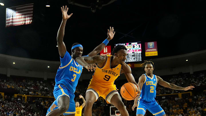 Arizona State Sun Devils center Shawn Phillips Jr. (9) backs down UCLA Bruins forward Adem Bona (3) during the second half at Desert Financial Arena in Tempe on Jan. 17, 2024. Arizona State Sun Devils center Shawn Phillips Jr. (9) backs down UCLA Bruins forward Adem Bona (3) during the second half at Desert Financial Arena in Tempe on Jan. 17, 2024.