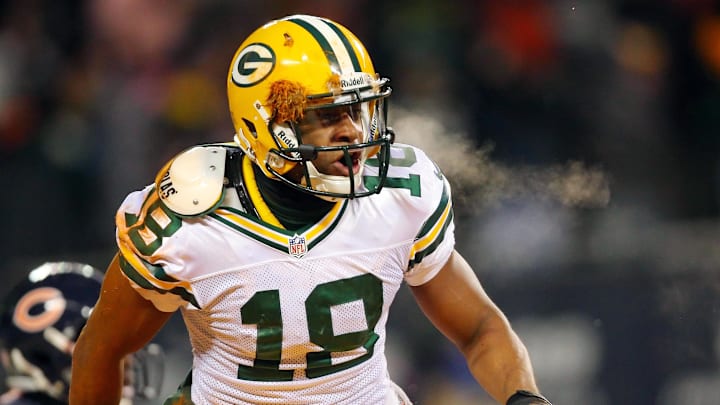 Dec 29, 2013; Chicago, IL, USA; Green Bay Packers wide receiver Randall Cobb (18) reacts to scoring the winning touchdown during the second half against the Chicago Bears at Soldier Field. Green Bay won 33-28. Mandatory Credit: Dennis Wierzbicki-Imagn Images