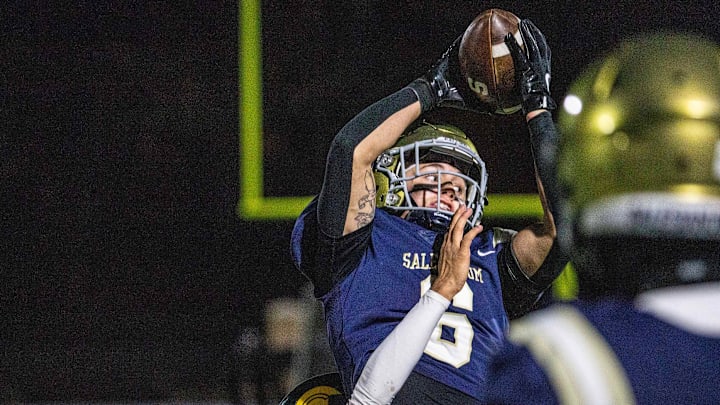 Salesianum senior William Neumann (6) catches a pass against rival Saint Mark's during the football game at Abessinio Stadium in Wilmington, Friday, Nov. 8, 2024. Salesianum won 63-17.