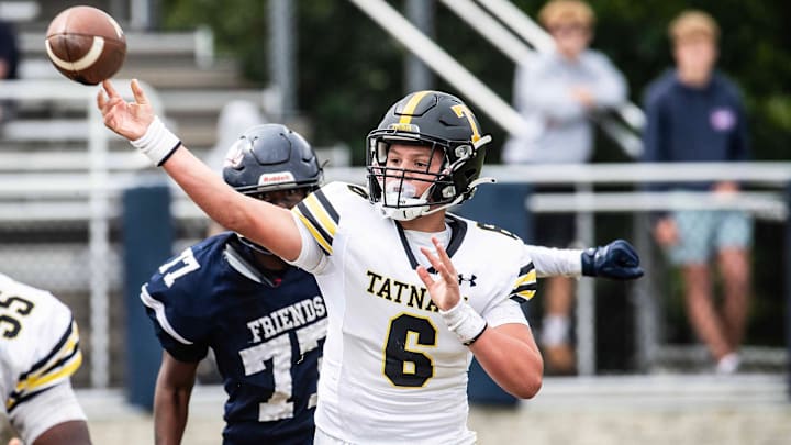 Tatnall junior Quinn deViere (6) throws a pass as Wilmington Friends senior Brandon Jones (77) bears down for the sack during the football game at the Wilmington Friends football stadium in Alapocas, Saturday, Sept. 7, 2024. Tatnall won 22-17.