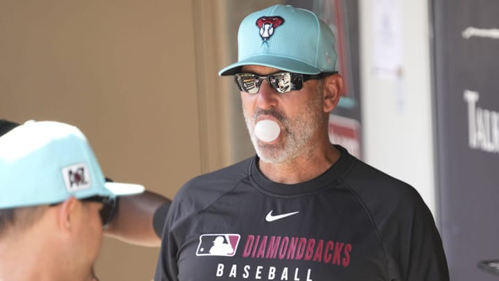 Arizona Diamondbacks manager Torey Lovullo blows a bubble during a spring training game against the Cleveland Guardians at Salt River Fields on Feb. 24, 2025. Arizona Diamondbacks manager Torey Lovullo blows a bubble during a spring training game against the Cleveland Guardians at Salt River Fields on Feb. 24, 2025.